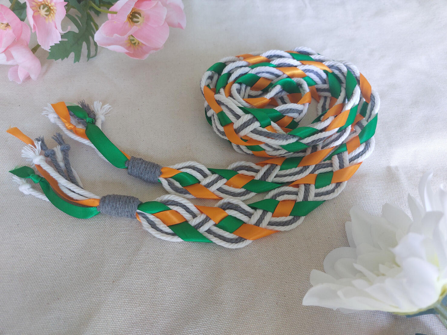 To symbolise the family unit incorporating the couple's favourite colours, as well as colours to represent their cats.